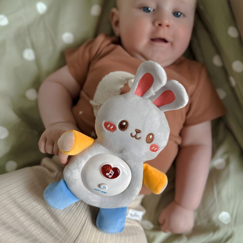 Woopie Baby muzikinis pliušinis migdukas "Zuikis", pilkas