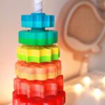 Sukamasis vaivorykštės bokštas WOOPIE BABY vaikams