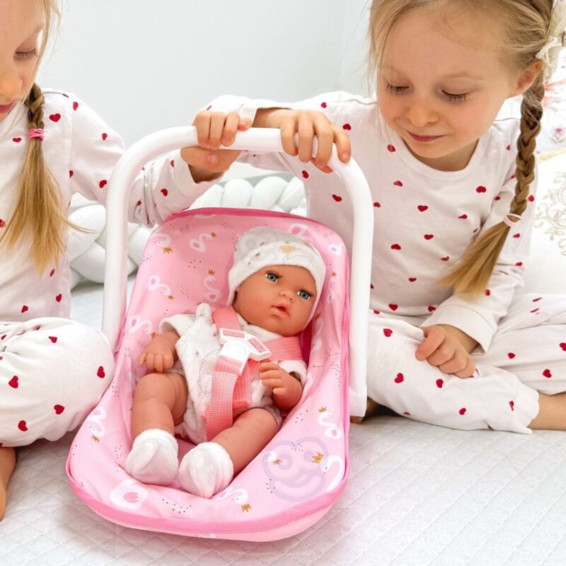 Žaislinis kūdikis ir rožinė nešioklė vaikams