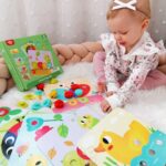 Medinė dėlionė su spalvotais kaišteliais kūdikiams