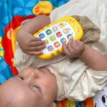 Woopie Baby žaislinis muzikinis telefonas vaikams, rožinis